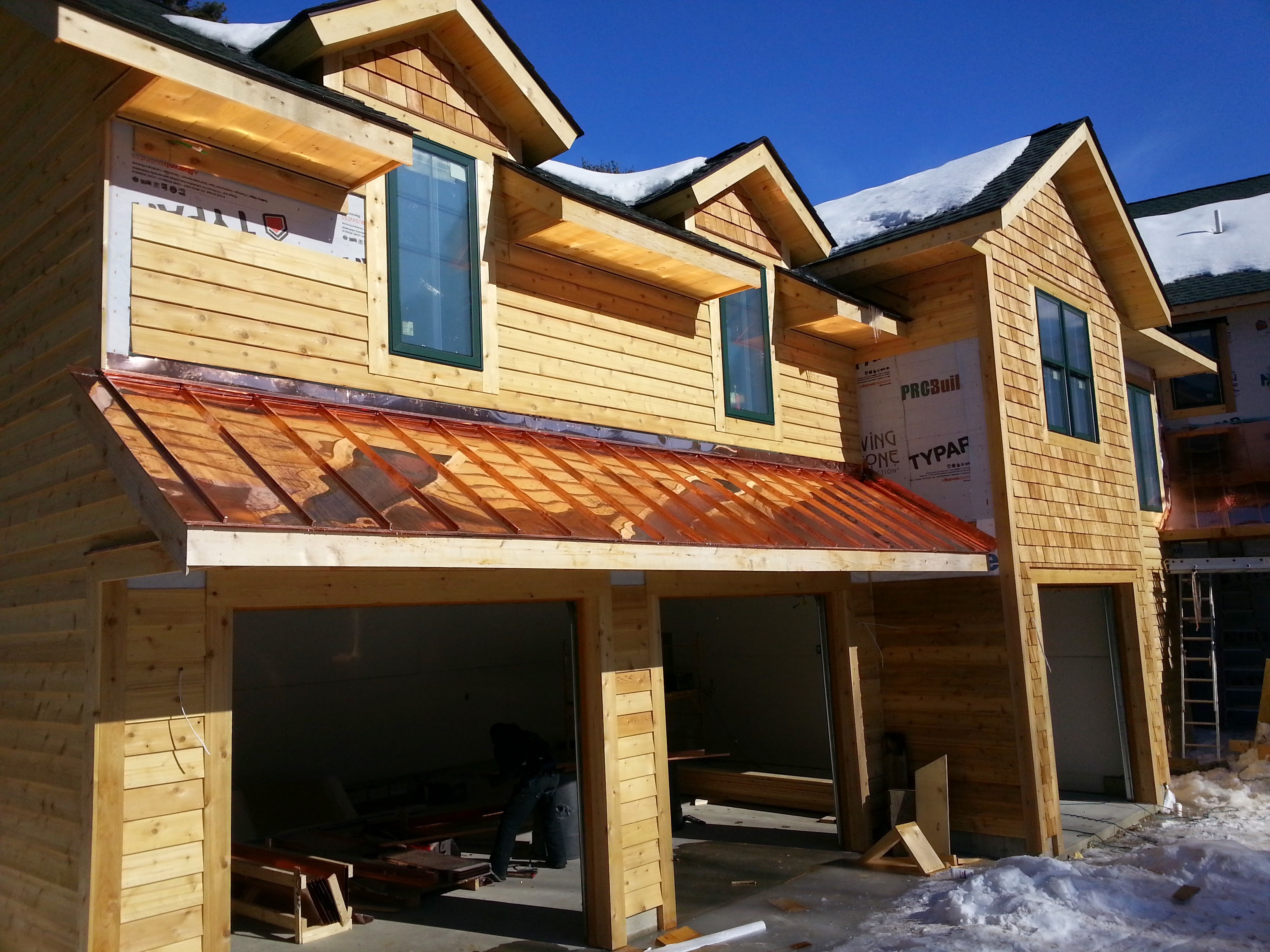 Copoer Standing seam and pine siding